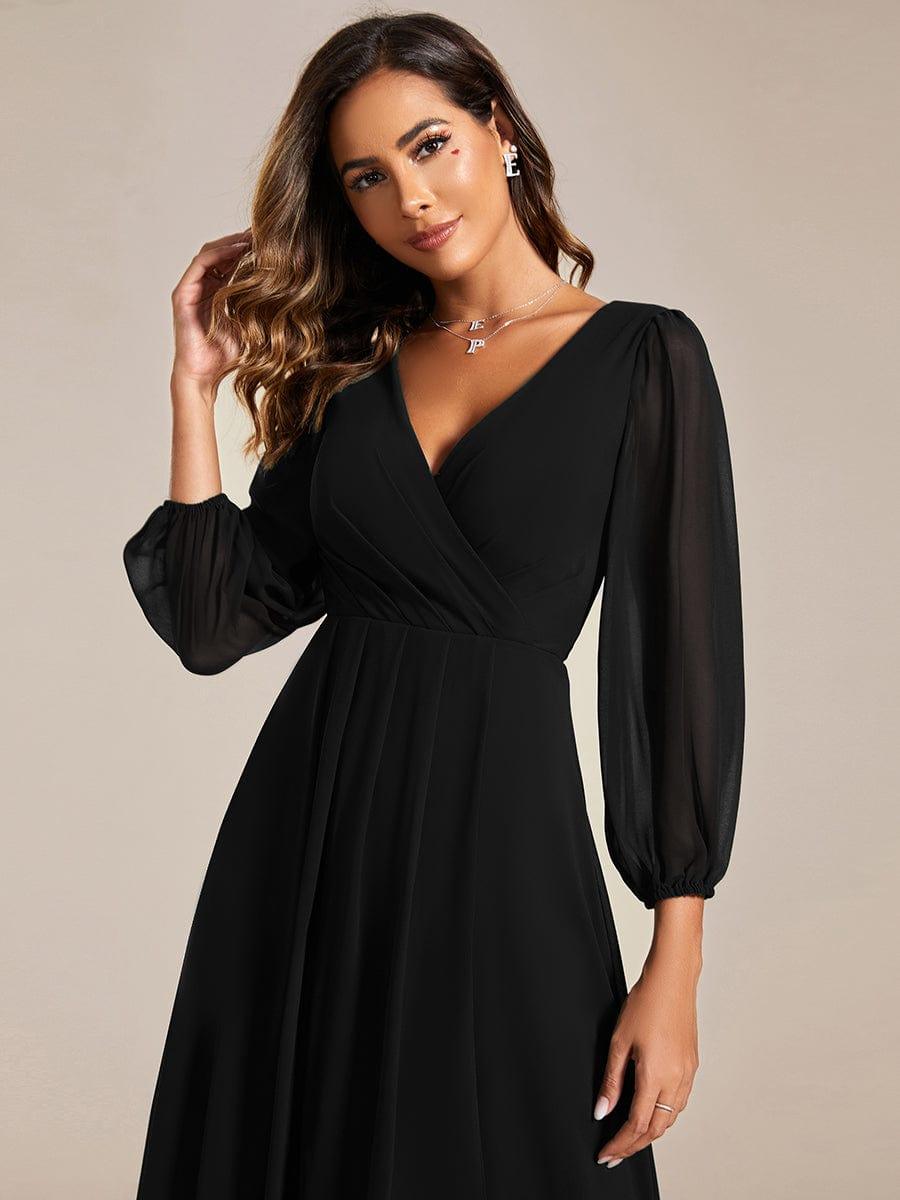 Robe d'invit¨¦ de mariage trap¨¨ze en mousseline fluide ¨¤ encolure ronde et longueur au genou #farbe_Schwarz Robe d'invit¨¦ de mariage trap¨¨ze en mousseline fluide ¨¤ encolure ronde et longueur au genou #farbe_Schwarz