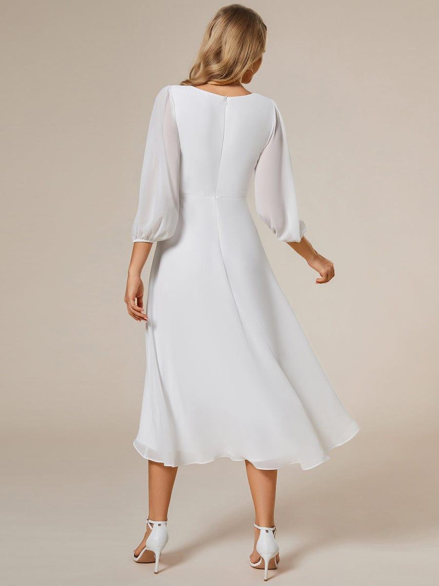 Robe d'invit¨¦ de mariage trap¨¨ze en mousseline fluide ¨¤ encolure ronde et longueur au genou #farbe_Weiss Robe d'invit¨¦ de mariage trap¨¨ze en mousseline fluide ¨¤ encolure ronde et longueur au genou #farbe_Weiss
