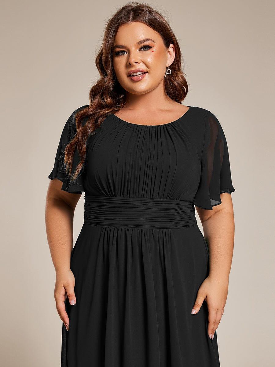 Robe d'invit¨¦ de mariage trap¨¨ze en mousseline fluide ¨¤ encolure ronde et longueur au genou #farbe_Schwarz Robe d'invit¨¦ de mariage trap¨¨ze en mousseline fluide ¨¤ encolure ronde et longueur au genou #farbe_Schwarz