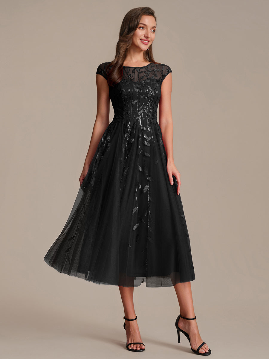 Tea L?nge A Linie Kleid Mit Rundhalsausschnitt Transparente Gestaltung Und Pailletten Kleid #Farbe_Schwarz