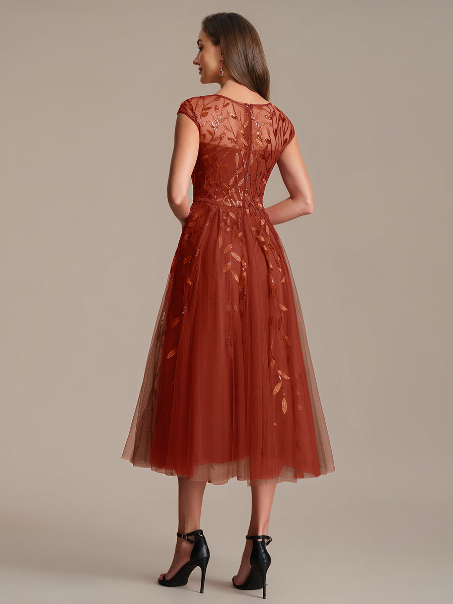 Tea L?nge A Linie Kleid Mit Rundhalsausschnitt Transparente Gestaltung Und Pailletten Kleid #Farbe_Gebranntes Orange
