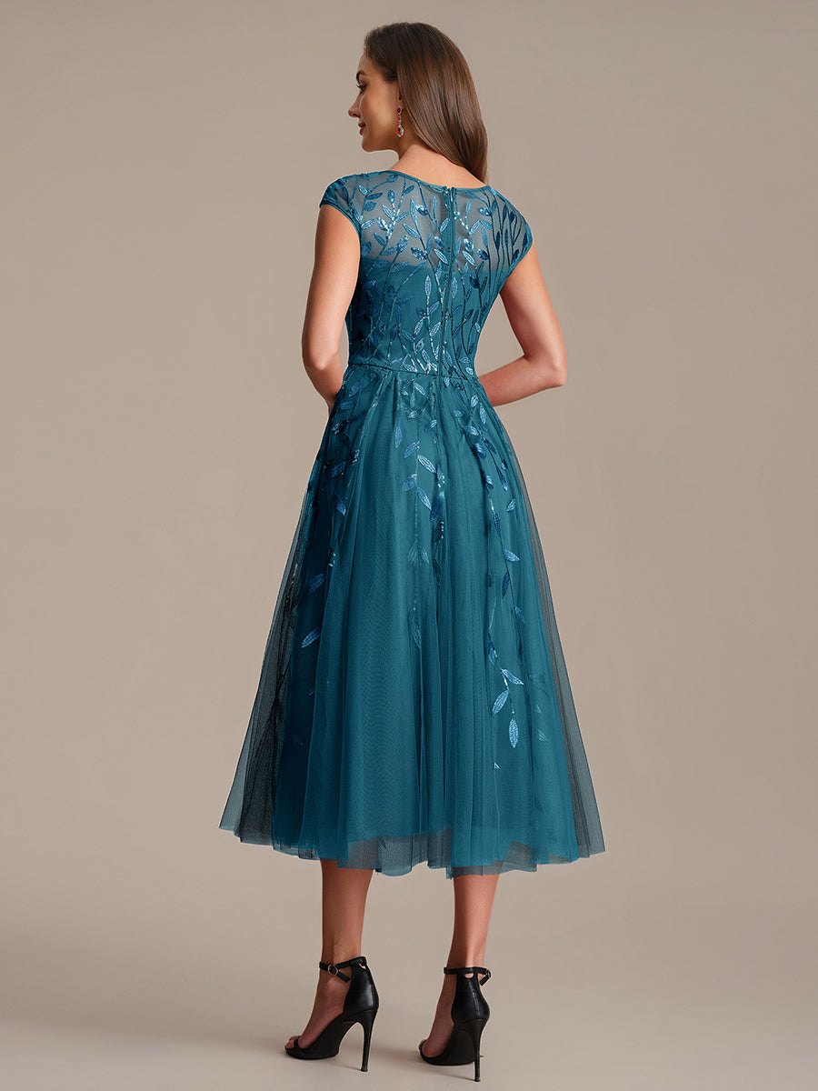 Tea L?nge A Linie Kleid Mit Rundhalsausschnitt Transparente Gestaltung Und Pailletten Kleid #Farbe_Petrol