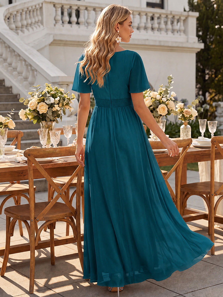 High-Low Chiffon Kleid Mit Rundhalsausschnitt Asymmetrischem Saum Gerüschten Und Rüschen Details Faltenoptik #Farbe_Petrol