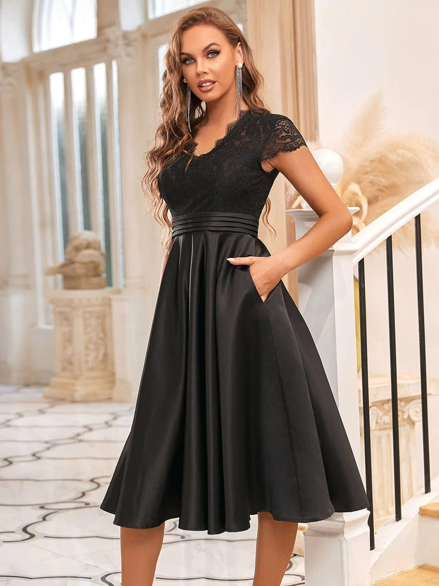 Elegantes Midi-Abendkleid mit V-Ausschnitt und gestickter Blume und kurzen Ärmeln 40400 #farbe_schwarz
