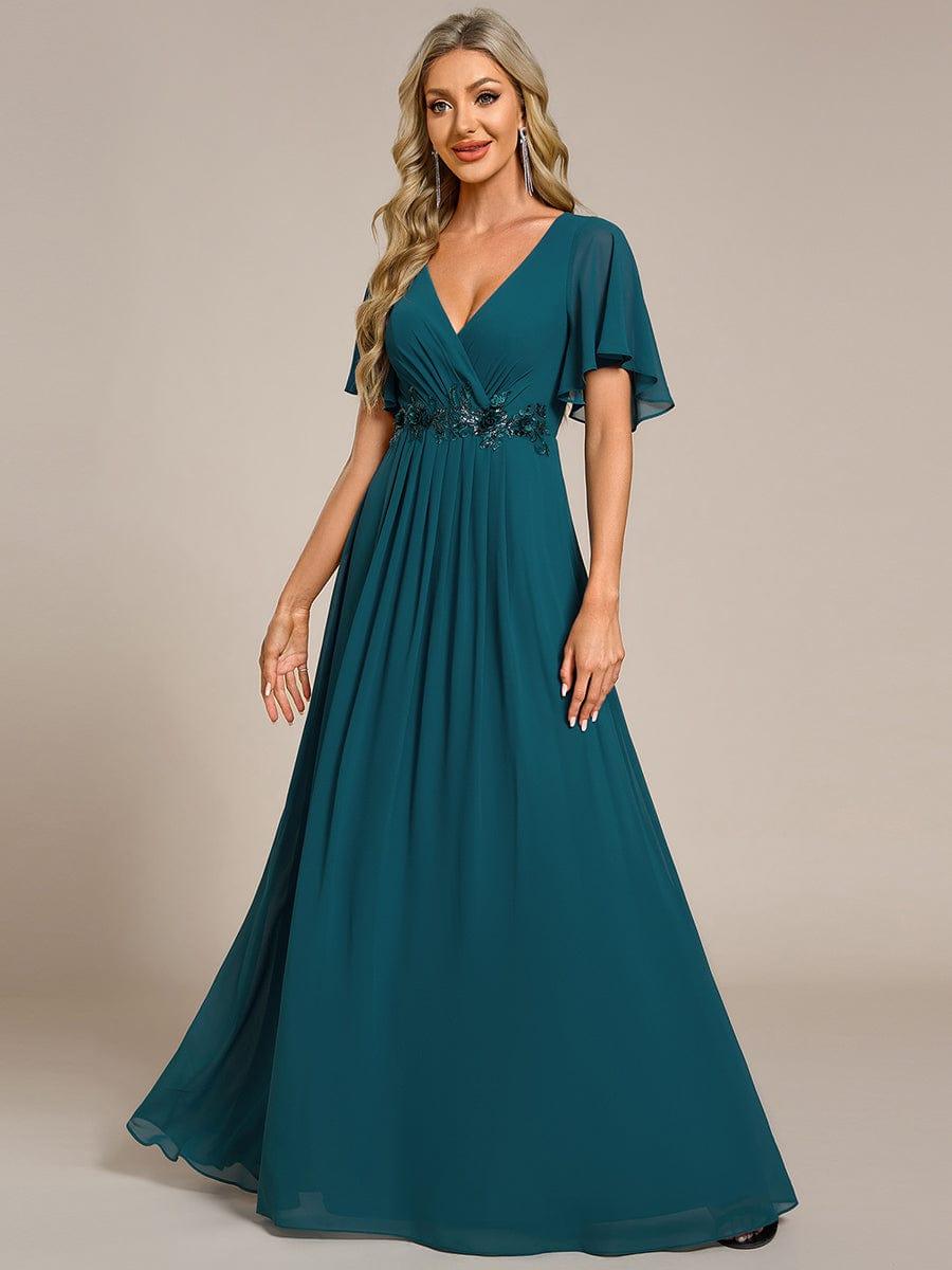 Glitzerndes A-Linien-Abendkleid mit Empire-Taille und langen Laternen?rmeln #farbe_Teal
