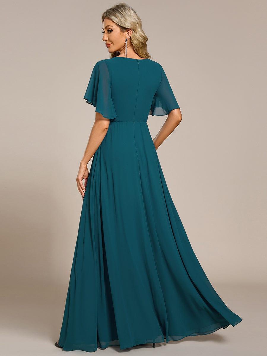 Glitzerndes A-Linien-Abendkleid mit Empire-Taille und langen Laternen?rmeln #farbe_Teal
