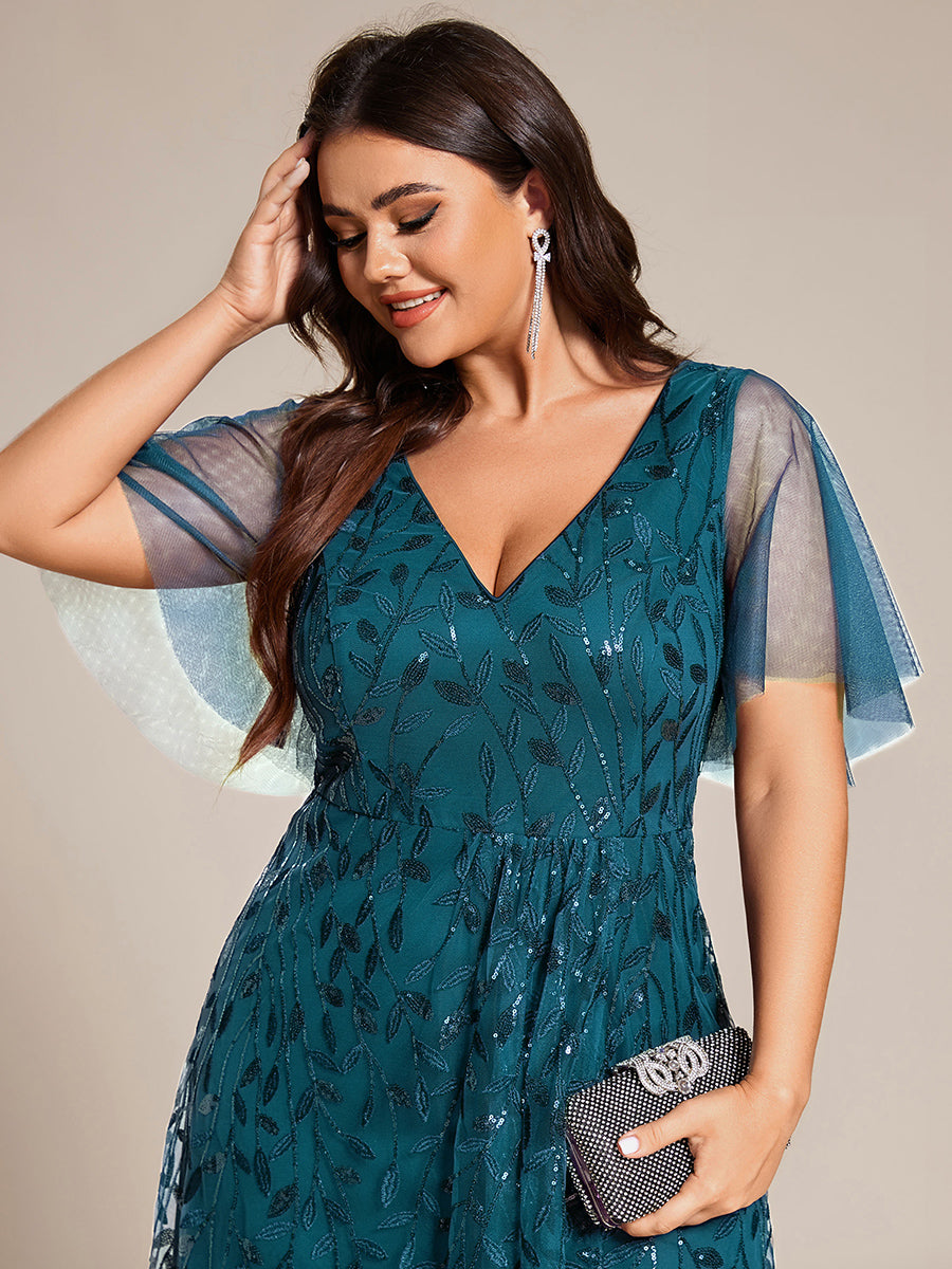 Maxilänge, V-Ausschnitt, asymmetrischer Saum, Pailletten-Kleid mit tiefem V-Ausschnitt und funkelnden Details #Farbe_Petrol
