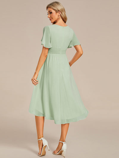 Robe d'invit¨¦ de mariage trap¨¨ze en mousseline fluide ¨¤ encolure ronde et longueur au genou #farbe_Mintgrün