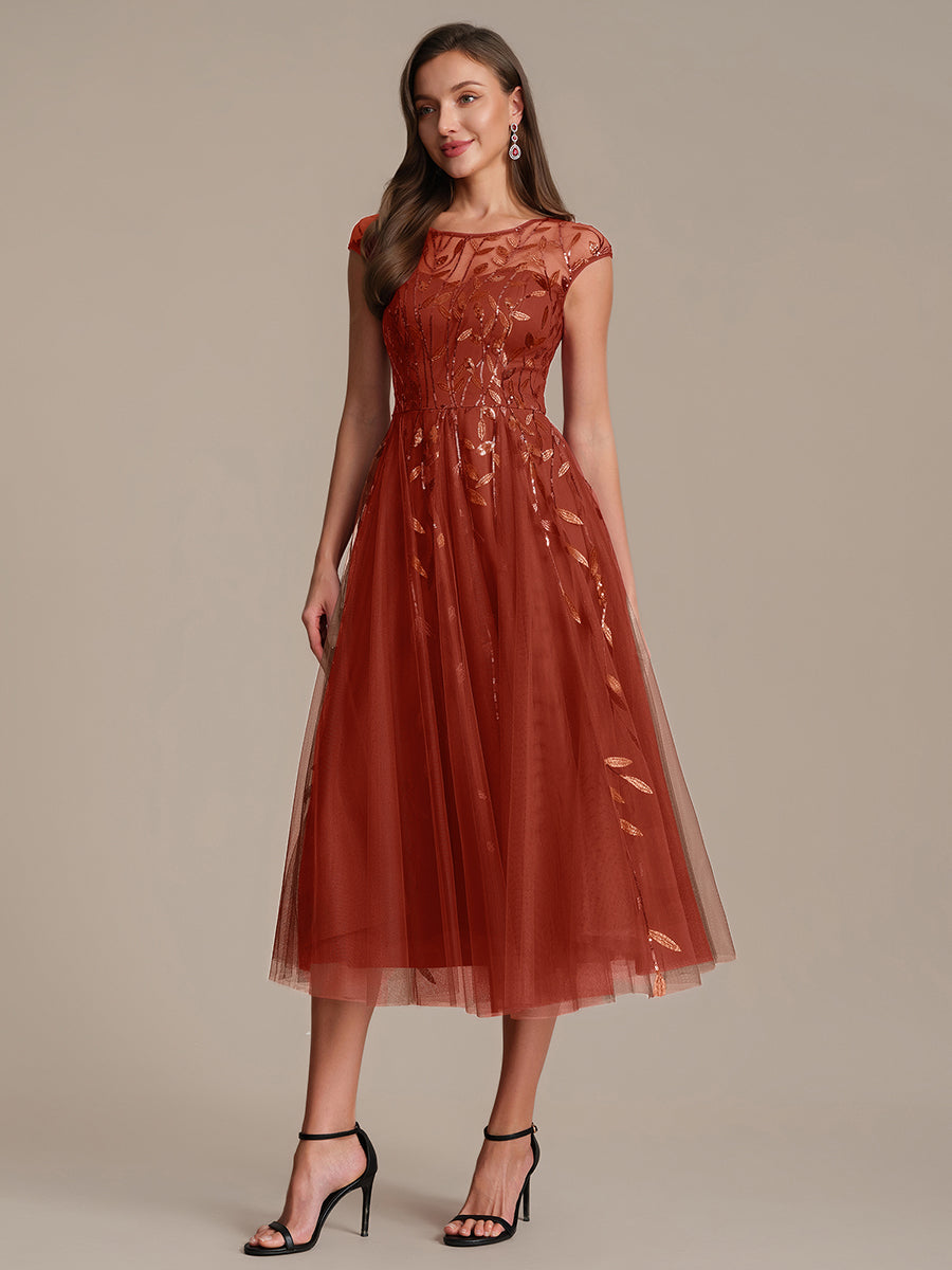 Tea L?nge A Linie Kleid Mit Rundhalsausschnitt Transparente Gestaltung Und Pailletten Kleid #Farbe_Gebranntes Orange