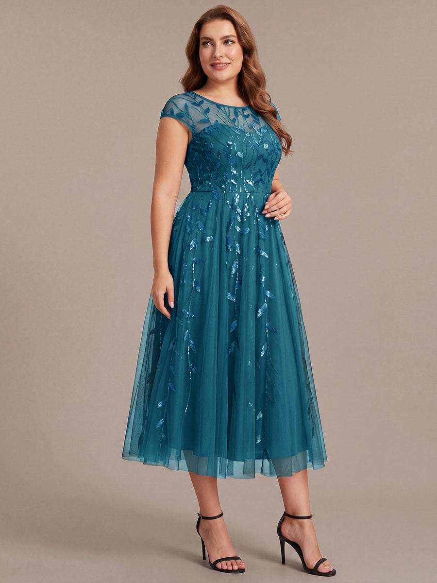 Tea L?nge A Linie Kleid Mit Rundhalsausschnitt Transparente Gestaltung Und Pailletten Kleid #Farbe_Petrol