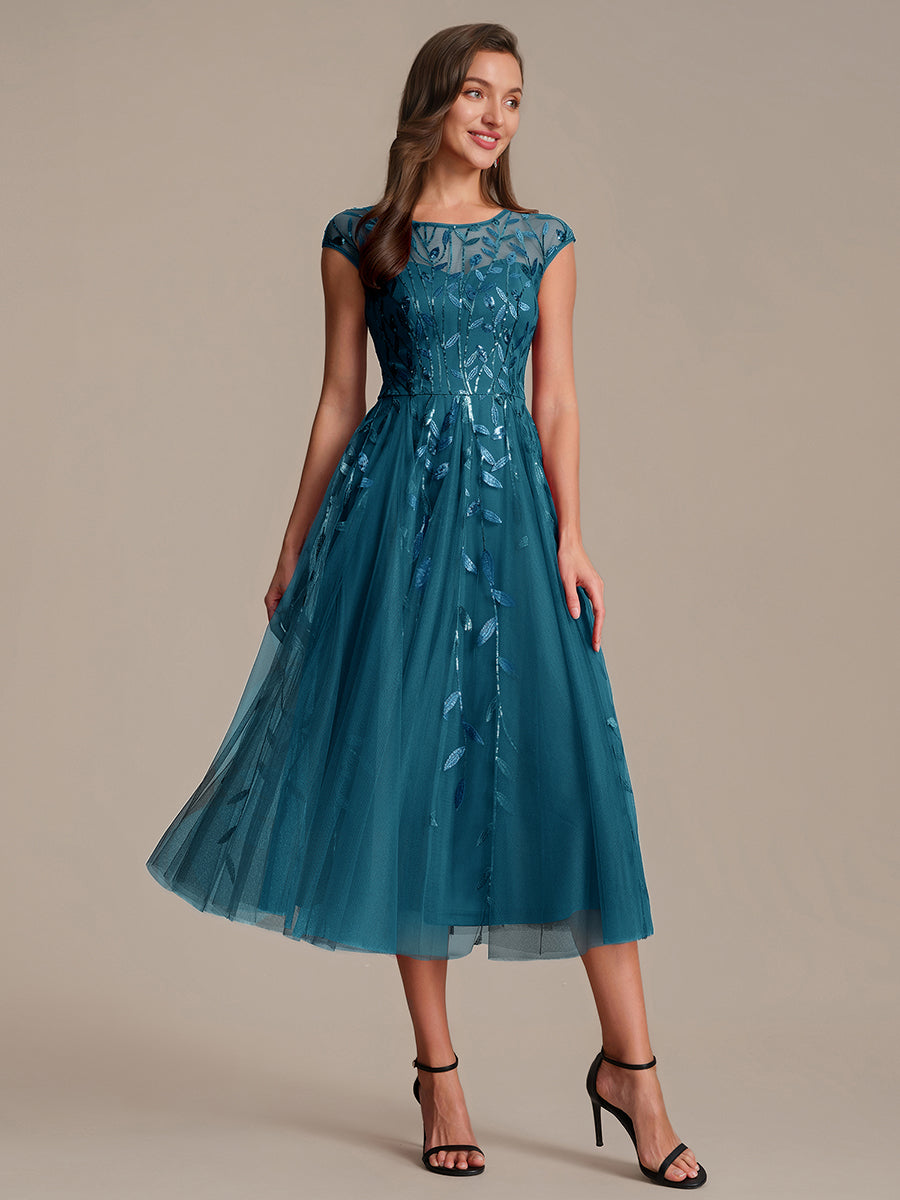 Tea L?nge A Linie Kleid Mit Rundhalsausschnitt Transparente Gestaltung Und Pailletten Kleid #Farbe_Petrol