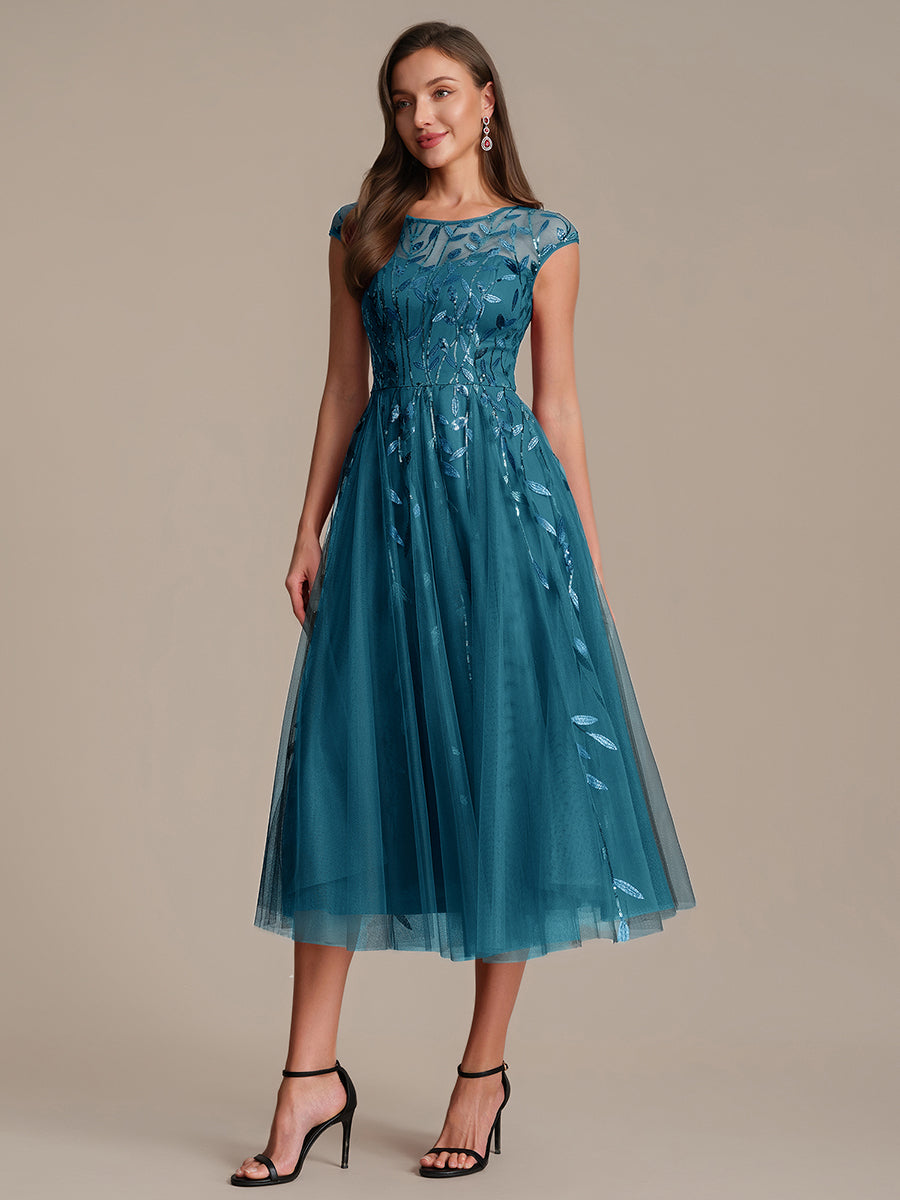 Tea L?nge A Linie Kleid Mit Rundhalsausschnitt Transparente Gestaltung Und Pailletten Kleid #Farbe_Petrol