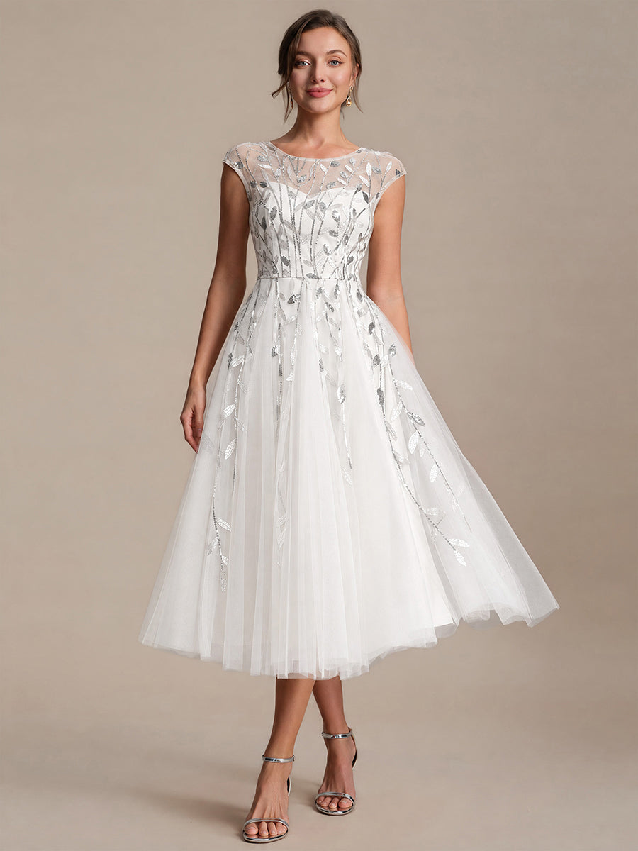 Tea L?nge A Linie Kleid Mit Rundhalsausschnitt Transparente Gestaltung Und Pailletten Kleid #Farbe_Weiß