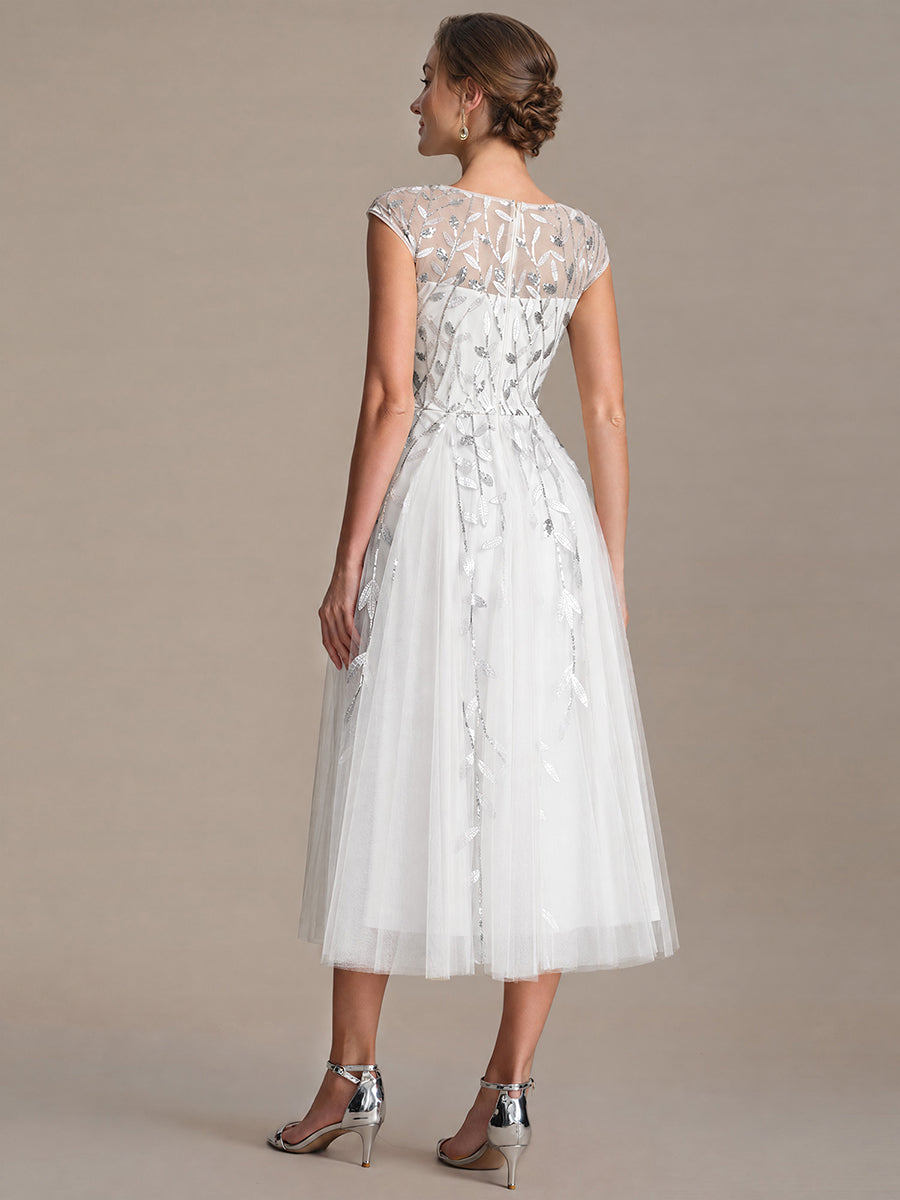 Tea L?nge A Linie Kleid Mit Rundhalsausschnitt Transparente Gestaltung Und Pailletten Kleid #Farbe_Weiß