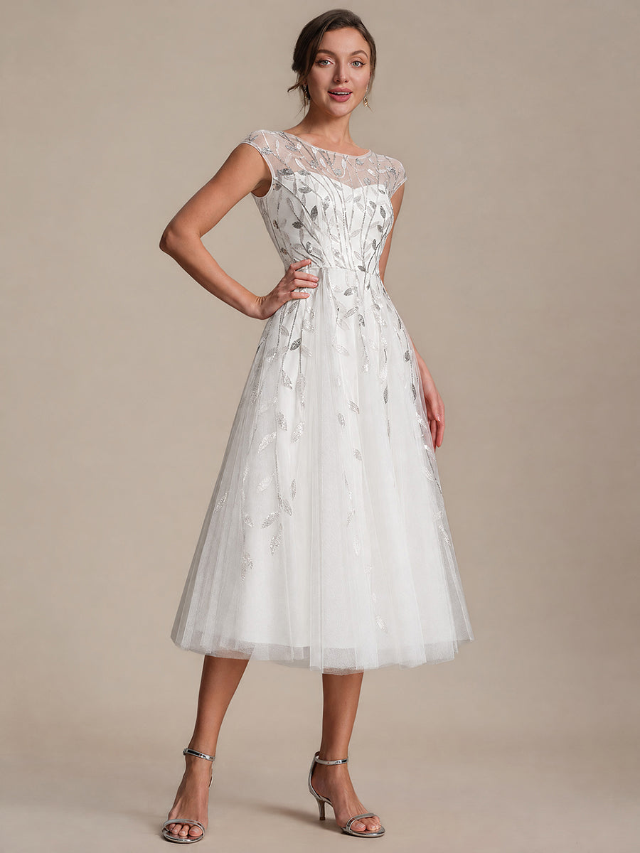 Tea L?nge A Linie Kleid Mit Rundhalsausschnitt Transparente Gestaltung Und Pailletten Kleid #Farbe_Weiß