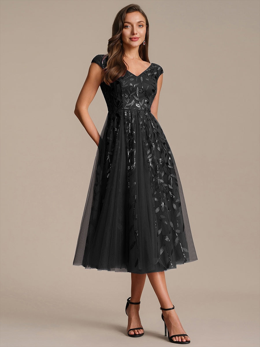 Midi Pailletten A-Linie Kleid Mit V-Ausschnitt Und Patchwork Details #Farbe_Schwarz