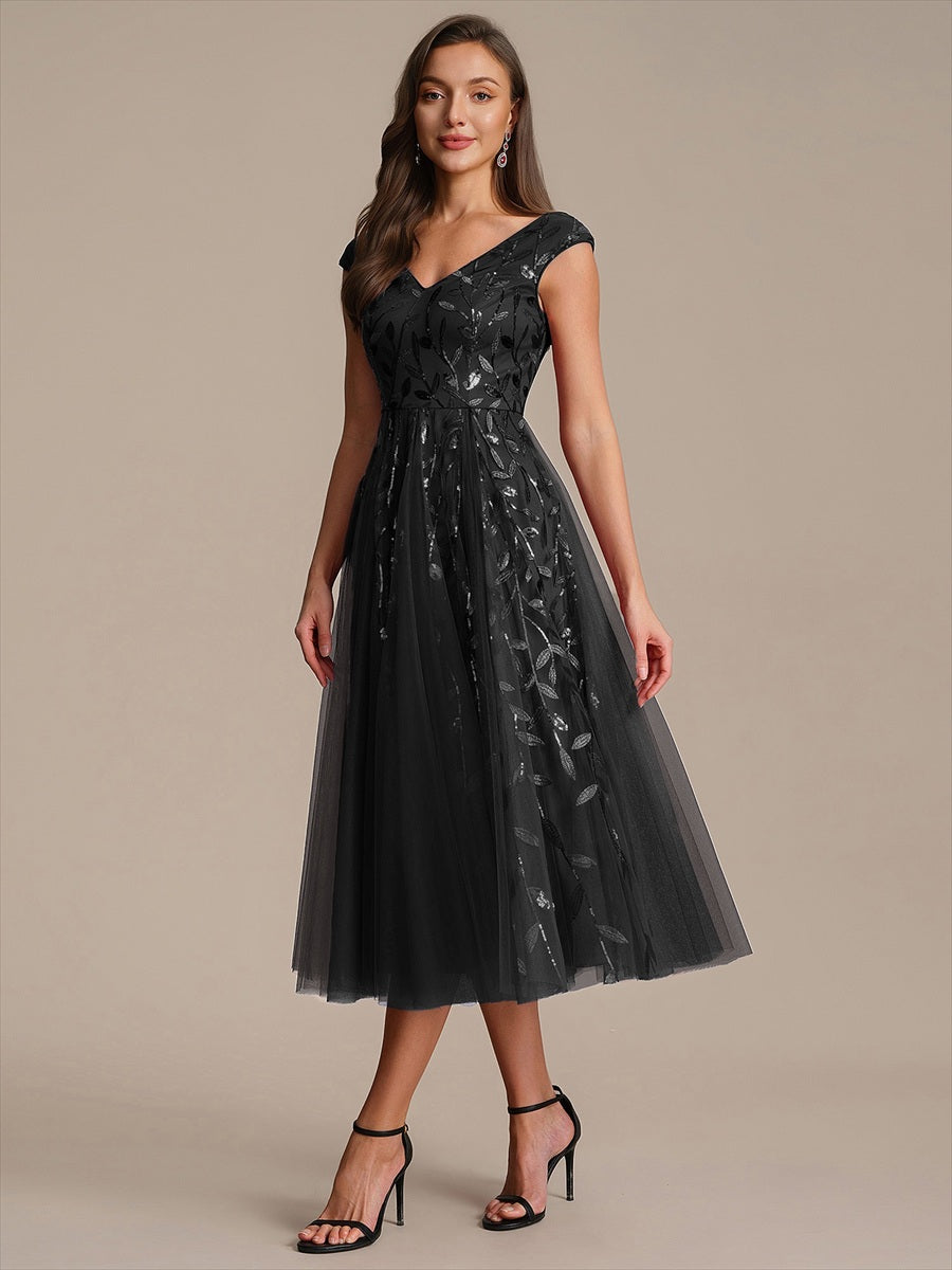Midi Pailletten A-Linie Kleid Mit V-Ausschnitt Und Patchwork Details #Farbe_Schwarz