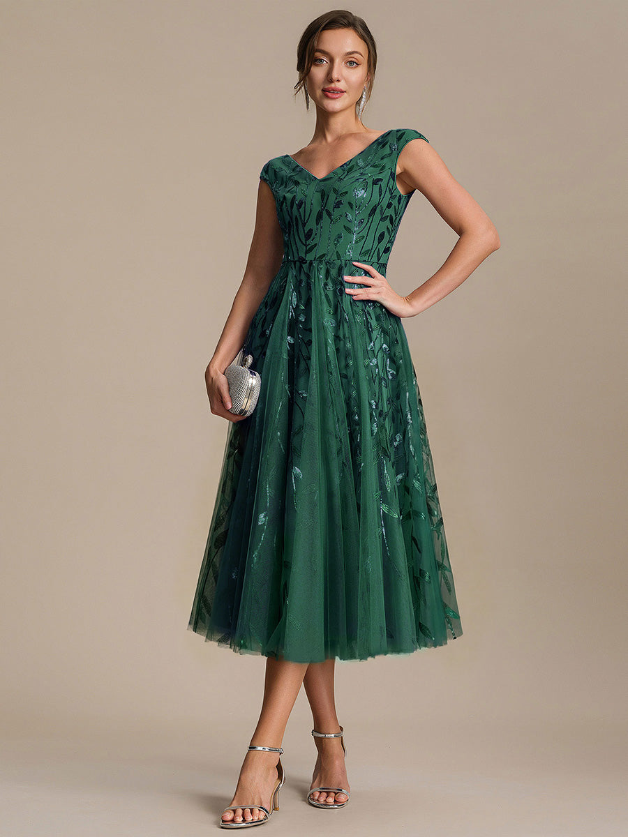 Midi Pailletten A-Linie Kleid Mit V-Ausschnitt Und Patchwork Details #Farbe_Dunkelgrün